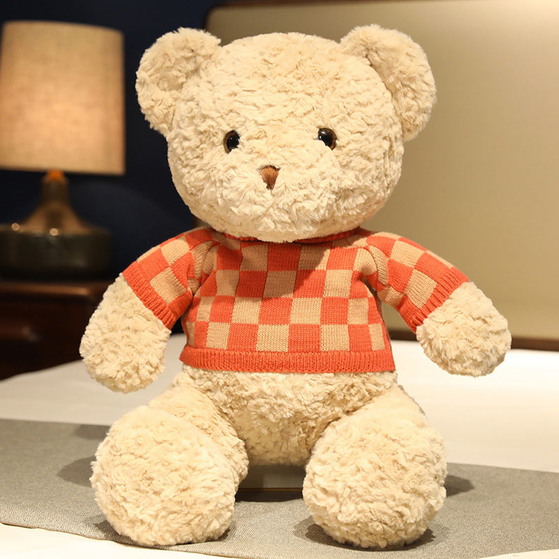 teddy bear with red sweater