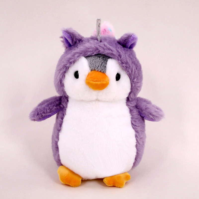 penguin plush in purple unicorn costume